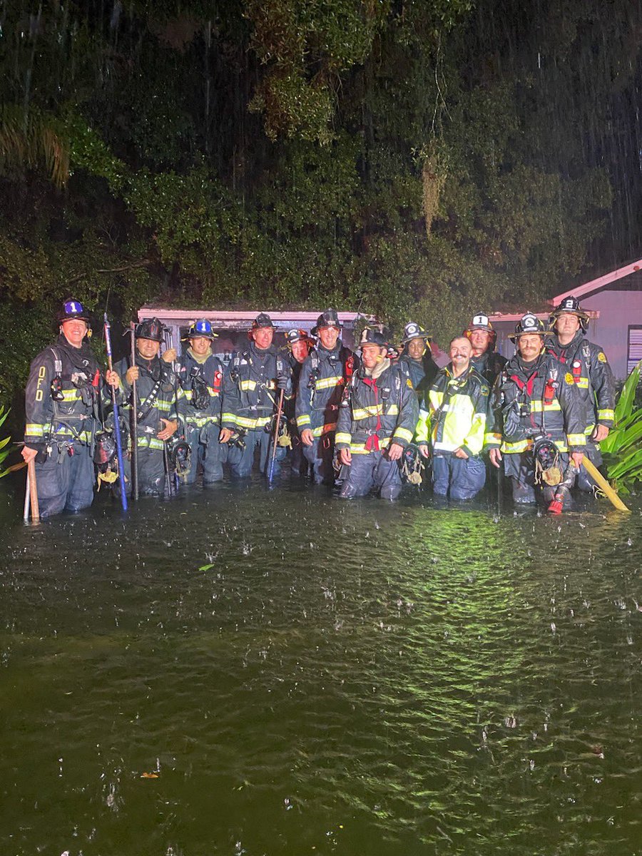 glassff's tweet photo. Local 1365 members in knee deep storm waters after fighting a fire during Hurricane Ian. https://t.co/PZ2J8bUTv4