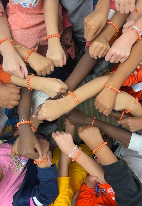 Today was Orange Shirt Day at school. Students wrote prayers, learned Cree words, listened to stories, and made orange bracelets in honour of Truth and Reconciliation.