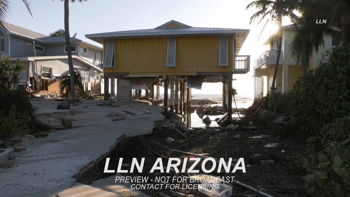 NewsPhotog_Jack's tweet photo. Several houses and businesses were serious damaged and the roads are completely covered in feet of sand from the surge. #Ian #Florida #Surge https://t.co/M1gRm4RT11