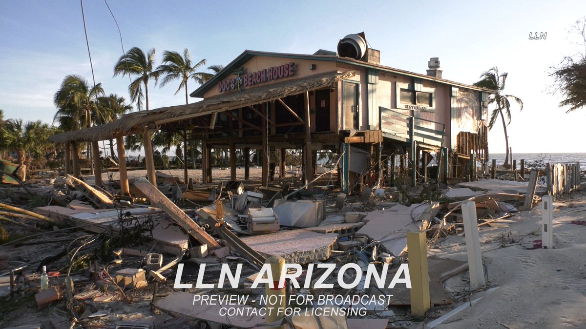 NewsPhotog_Jack's tweet photo. Several houses and businesses were serious damaged and the roads are completely covered in feet of sand from the surge. #Ian #Florida #Surge https://t.co/M1gRm4RT11
