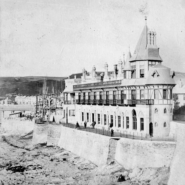 Just seen this clean, very early, picture of JP Seddon's southern wing of Castle Hotel, Aberystwyth (now Old College, Aber Uni). Chimneys are Ransome's Artificial Stone. Wonder why I found this unsent; it's a beautiful picture for any Aberystwyth fan.