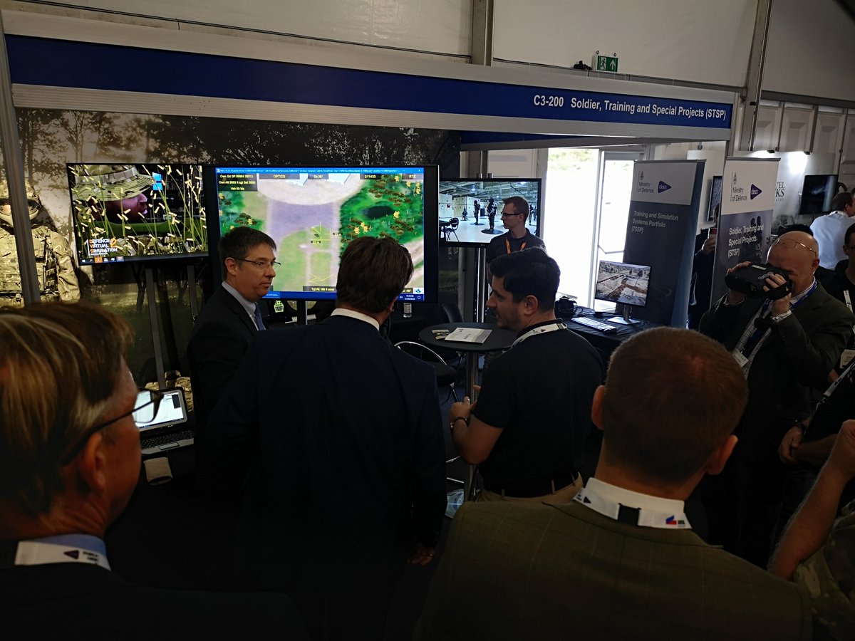BISimulations's tweet photo. BISim was privileged to be a part of the @DefenceES Soldier Training and Special Projects (#STSP) booth at #DVD2022. The UK Defence Procurement Minister, Alec Shelbrooke, was briefed about the capabilities and benefits of #DVS2  alongside Cubic Defence UK LTD with #SCOPIC2. https://t.co/fJ5awXDe1U