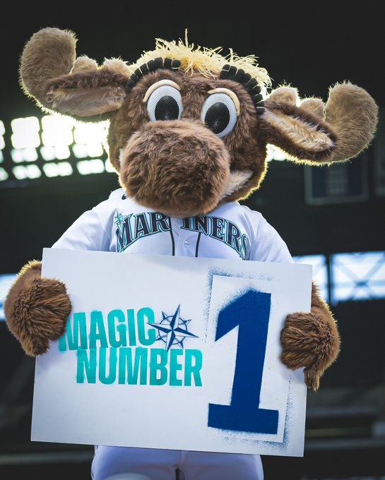 Mariner Moose holds a sign that reads, “MAGIC NUMBER: 1” 