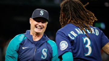 Scott Servais smiles at J.P. after the walk-off.