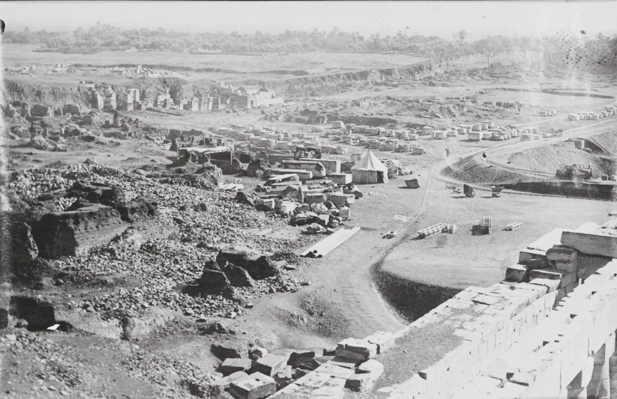 ProjectSura's tweet photo. Decauville railways were used for carting off rubble &amp; blocks from the northern gate of the great hypostyle hall towards this storage yard. Along the enclosure wall of the complex, one also sees the remains of the temple of Ptah, being cleared by Legrain's team since 1899. https://t.co/nU0VdoSFhe