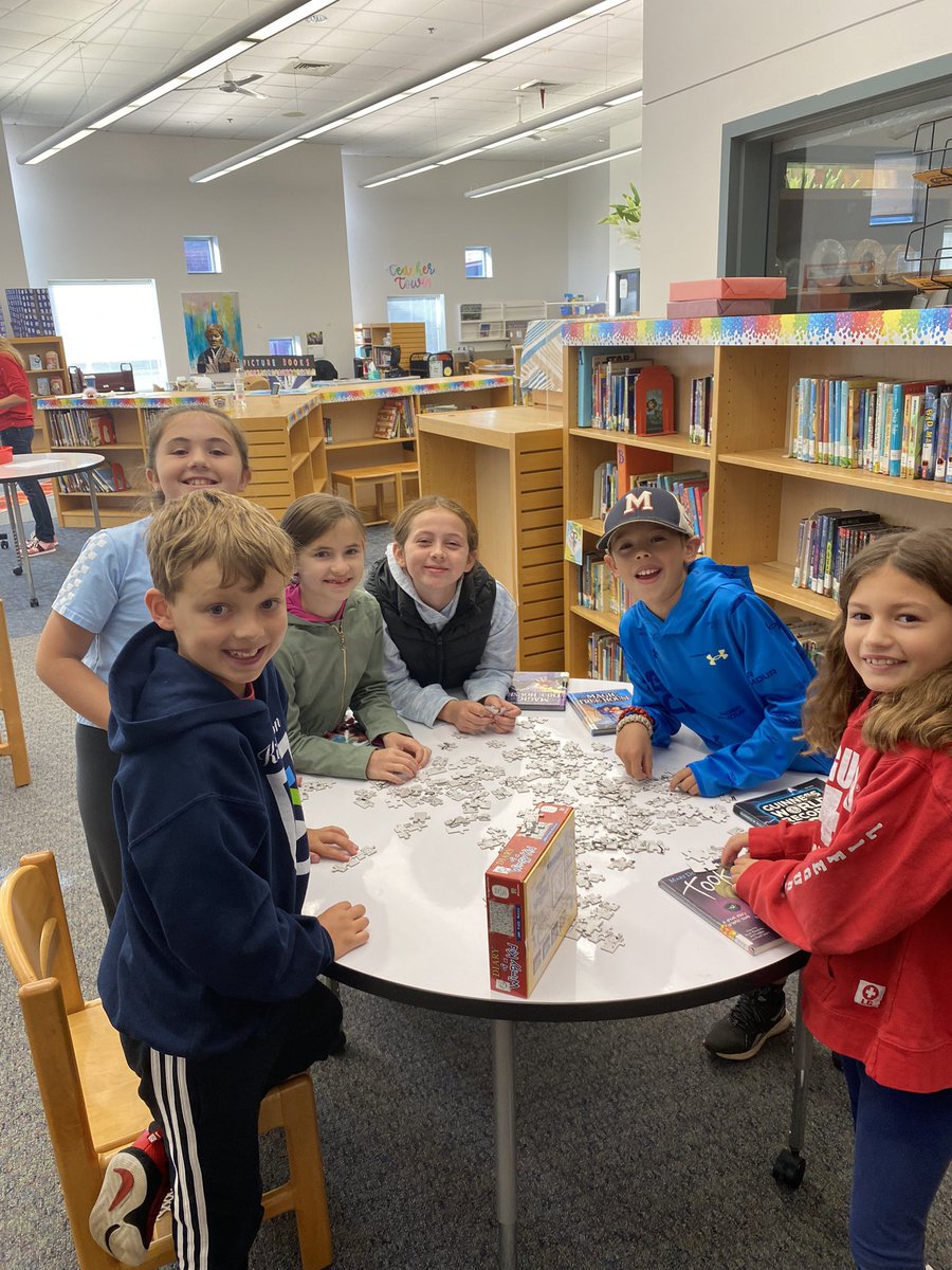 MrsSheroff's tweet image. Exploring the library! 📚😃