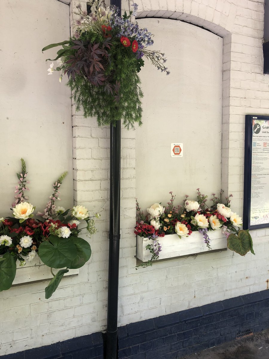Over the past few weeks we’ve been beautifying New Barnet Railway Station with artificial flowers courtesy of an extremely generous donation. Does anyone have any old hanging baskets they no longer require?  If so please get in touch.  Thanks <a href="/The_Flowerbank/">The Flower Bank</a> <a href="/GNRailUK/">Great Northern</a>