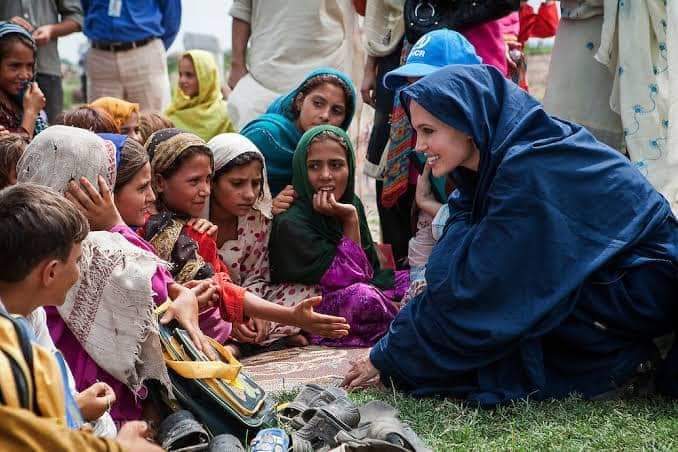 NavdRM's tweet photo. Look,Angelina  Julie in pakistan flood areas, https://t.co/RHOqlx6QAz