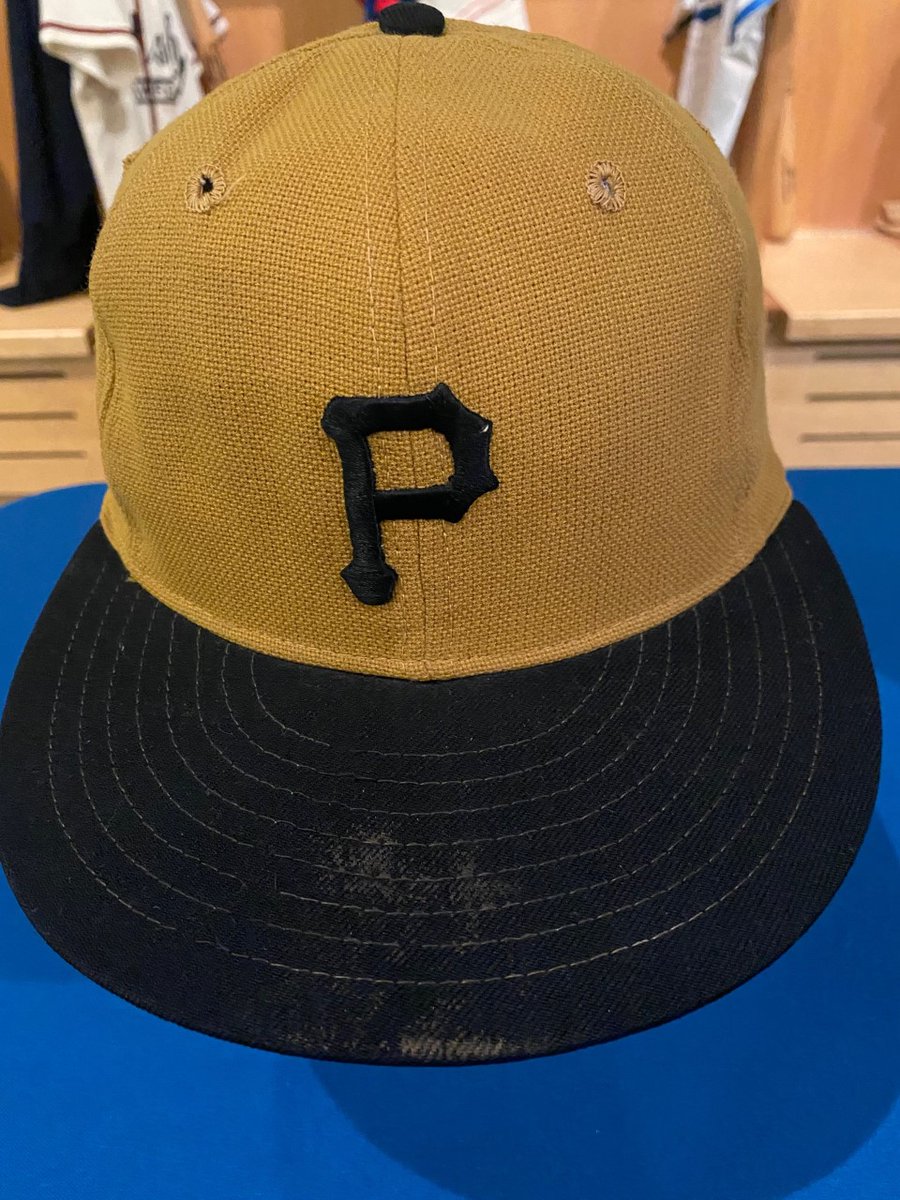 StevePindar's tweet photo. 50 years ago today, Roberto Clemente, the Great One, got his 3000th and final MLB hit.  Pictured is the cap he was wearing when he got that hit, a double, off Jon Matlack of the Mets.  On the bill of the cap, you'll see dirt from Clemente's hand.  Arriba! https://t.co/91p0iIvTEr