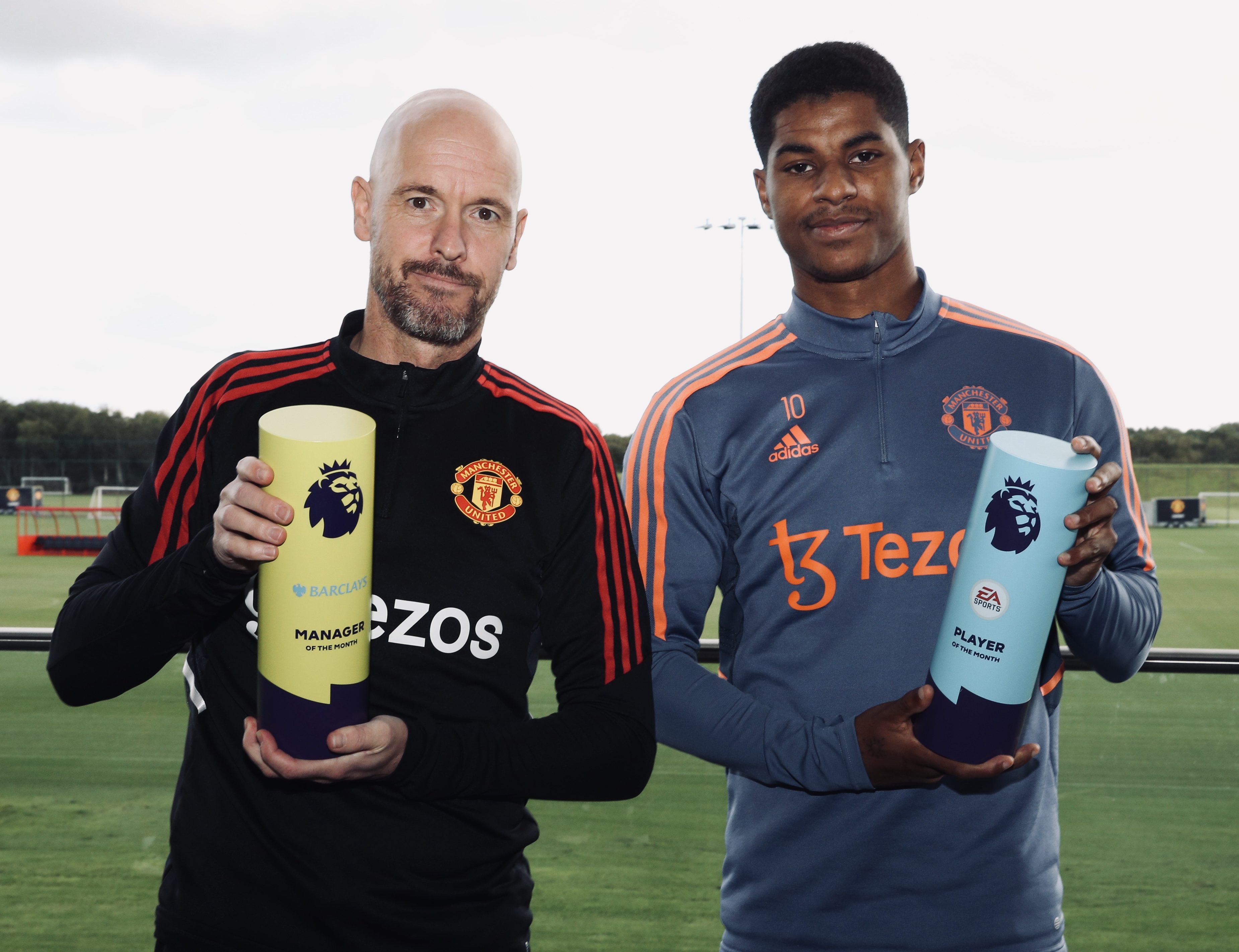 Erik ten Hag and Marcus Rashford are pictured with the Premier League's Manager and Player of the Month awards for September.