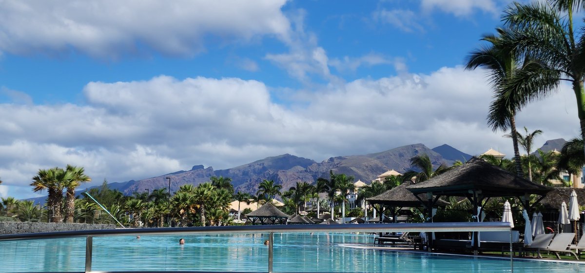 corneliusKAP's tweet photo. Honeymoon views in Tenerife. Slowly catching back up with the boys on @PatMcAfeeShow, sippin' some Johnny Walker w/ Coke Zero. Life is wonderful. https://t.co/Dd57v9Q4SL