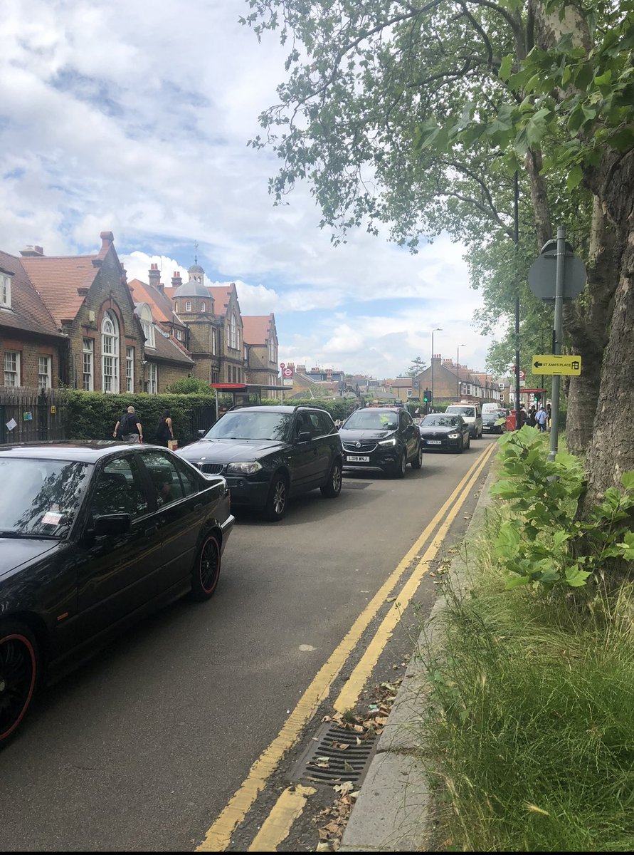 cmdkenyon's tweet photo. This is what traffic used to look like outside our local school each morning. It was dangerous for pupils to cross the road, it was noisy and you could taste the pollution in the air. https://t.co/5bV5J5iAMy