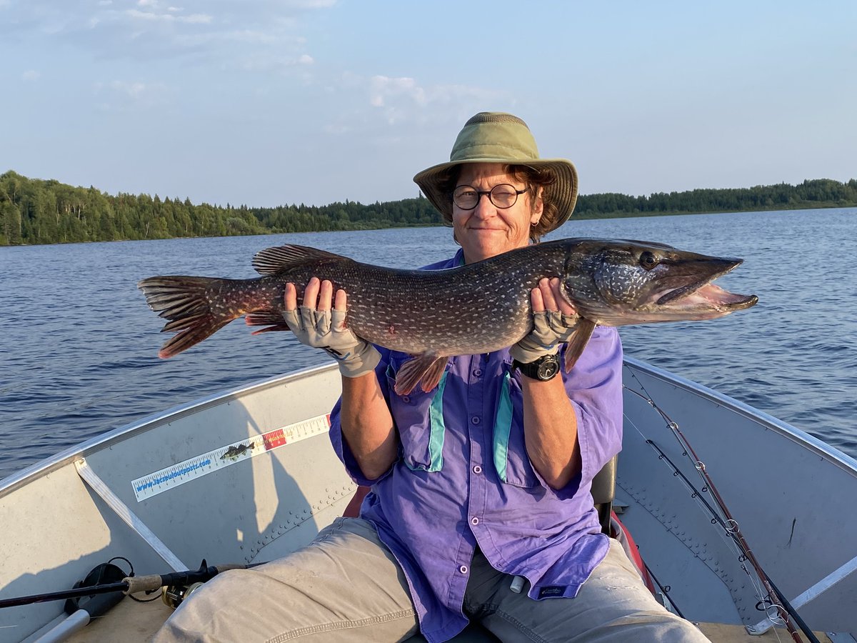 Friday Photo (not a farm flashback!): The entire time we farmed (25 years), Melissa hardly fished at all. Now that she’s retired, she catches some big ones! (BTW…She practices catch and release, so the fish came out, posed for photo, then went back in the water.)
