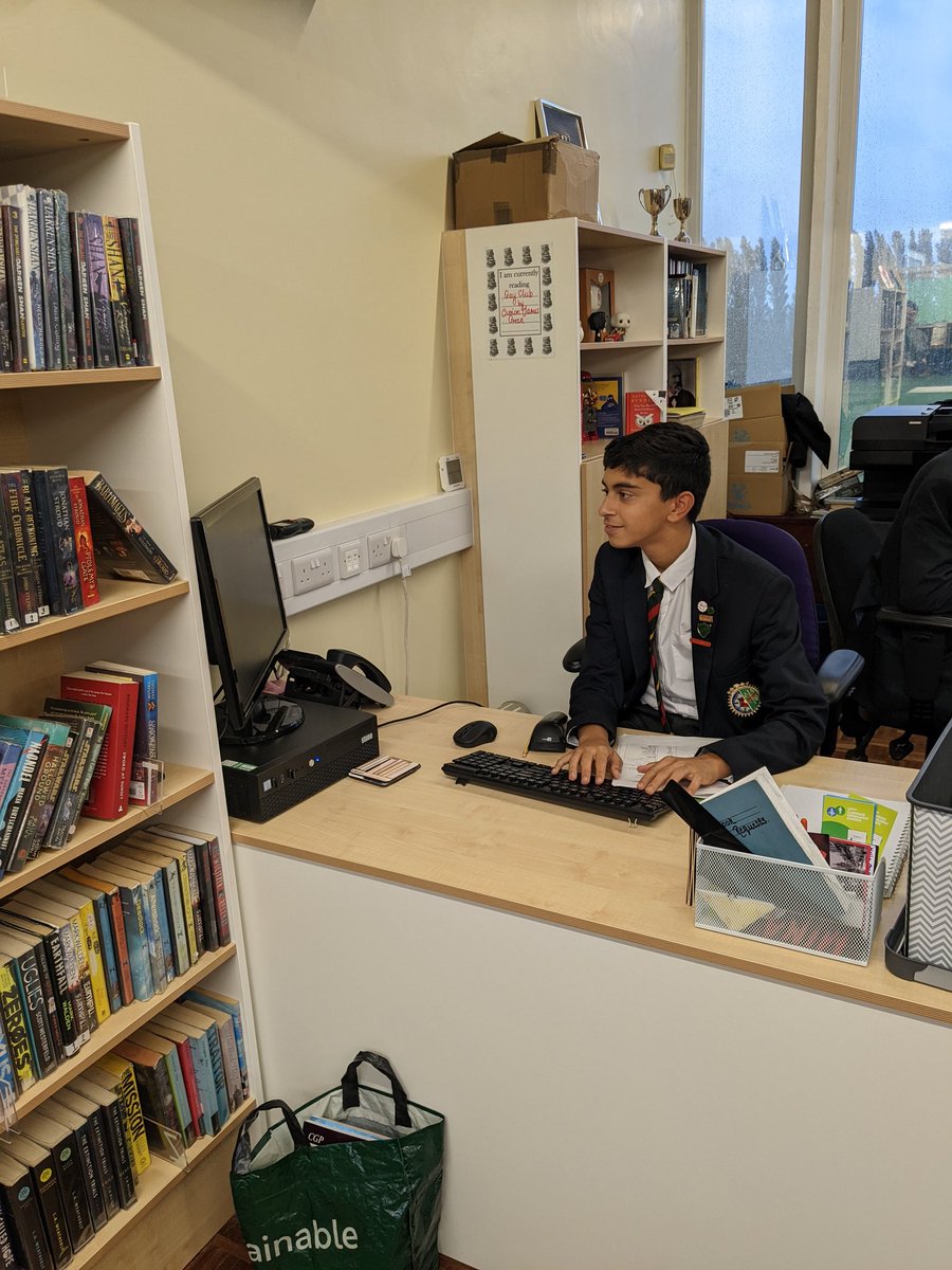 QMGS_Year10's tweet photo. Excellent to see Ibraheem doing his shift as student librarian this lunch time! @LibraryQmgs #GenerousInApproach #BeACredit https://t.co/hEtP6Sb9Ph