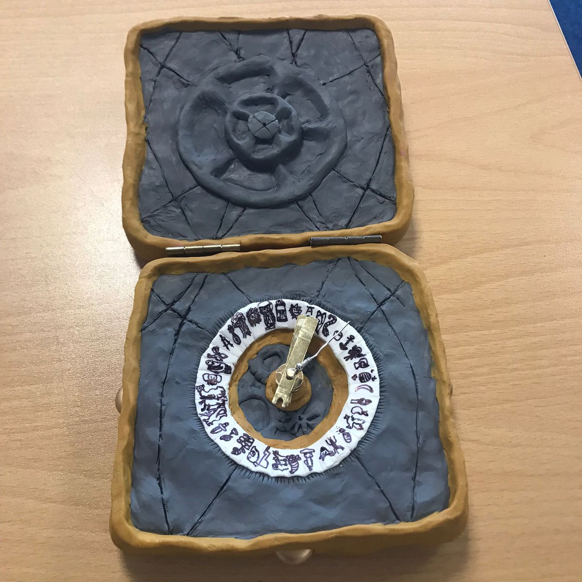 KnoxEnglish's tweet photo. Look at this amazing S2’s homework project for “His Dark Materials”! It’s an alethiometer! What questions should we ask it?… ✨💫 @knoxacademy https://t.co/4Fy677k5Hq