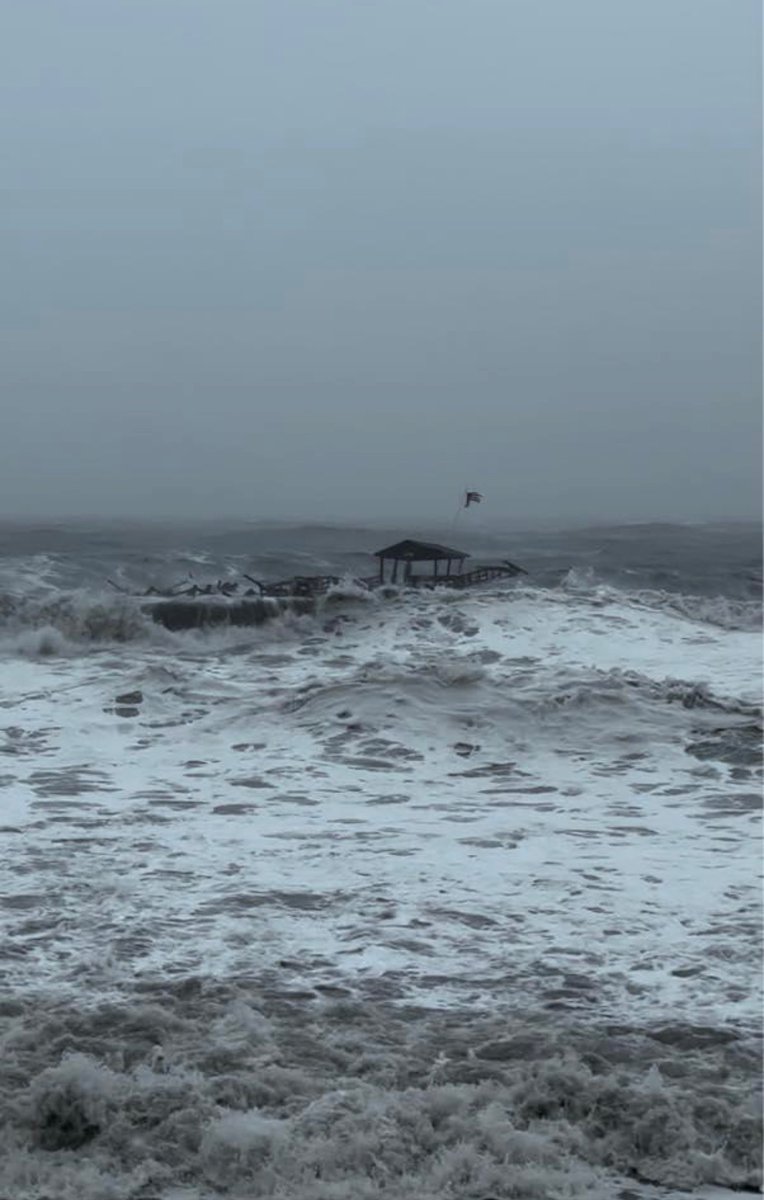 The end of the Pawleys Island pier has collapsed & is floating south.