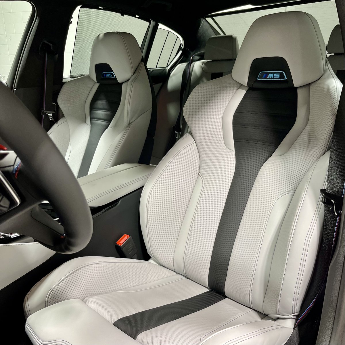 BMWofDarien's tweet photo. We love the Silverstone Merino leather interior on this 2023 BMW M5 Competition. What is your favorite part of the M5? https://t.co/WnRsA8srl2