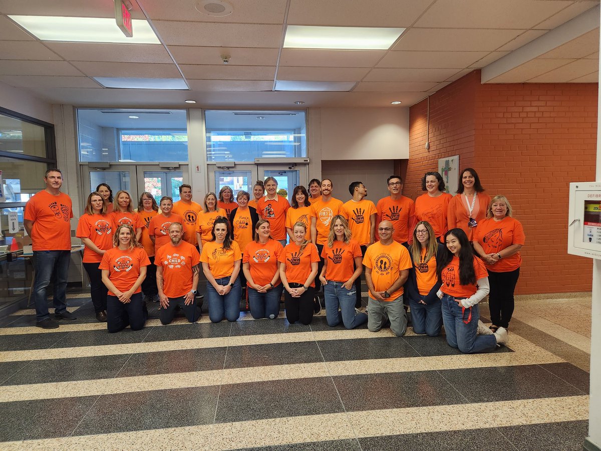 GDHSGlobalEd's tweet photo. GDHS staff commemorating Orange Shirt Day. Great learning is also being done in classes to honour the victims of Residential schools and to work towards Truth &amp; Reconciliation. #EveryChildMatters https://t.co/6XJkAKj9oW