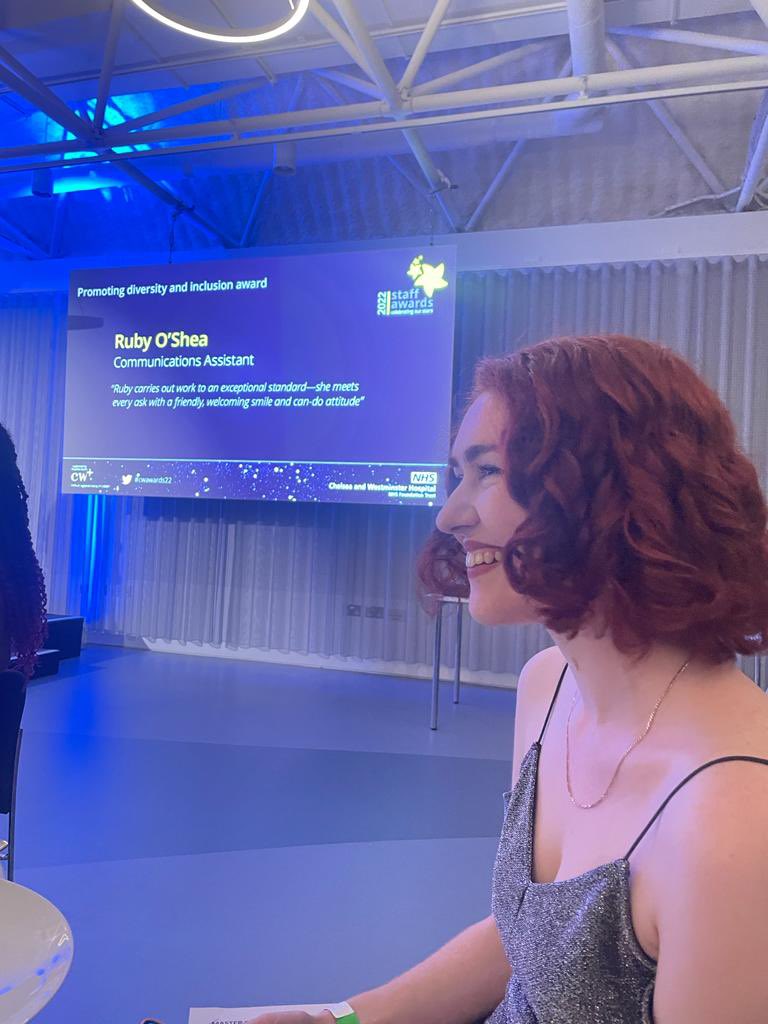 rubyoshea_'s tweet image. Thank you to @NHSEnglandLDN Comms star @sofiasartori1 for the pic - seeing your name on a big screen = big cheesy grin ⭐️ #cwawards2022 #NHSComms