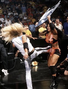 #OnThisDay in 2002, Victoria & Trish Stratus infamous chair shot took place. https://t.co/OpjvXZmC5y