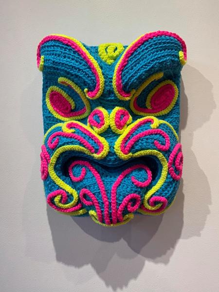 Auckland artists Lissy Robinson-Cole and partner Rudi create dayglo Whakairo and pou using crochet, describing their work as “igniting joy globally"