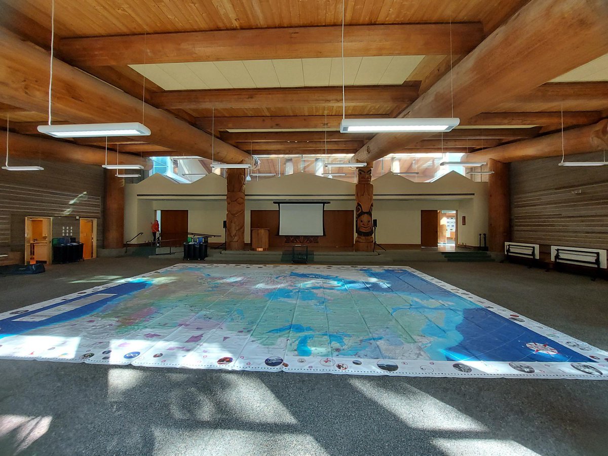 All set up in the <a href="/UBCLonghouse/">UBC Longhouse</a> ! Family friendly learning activities are available today. Come see our book display, giant floor map, and paint a rock for our garden 🧡
