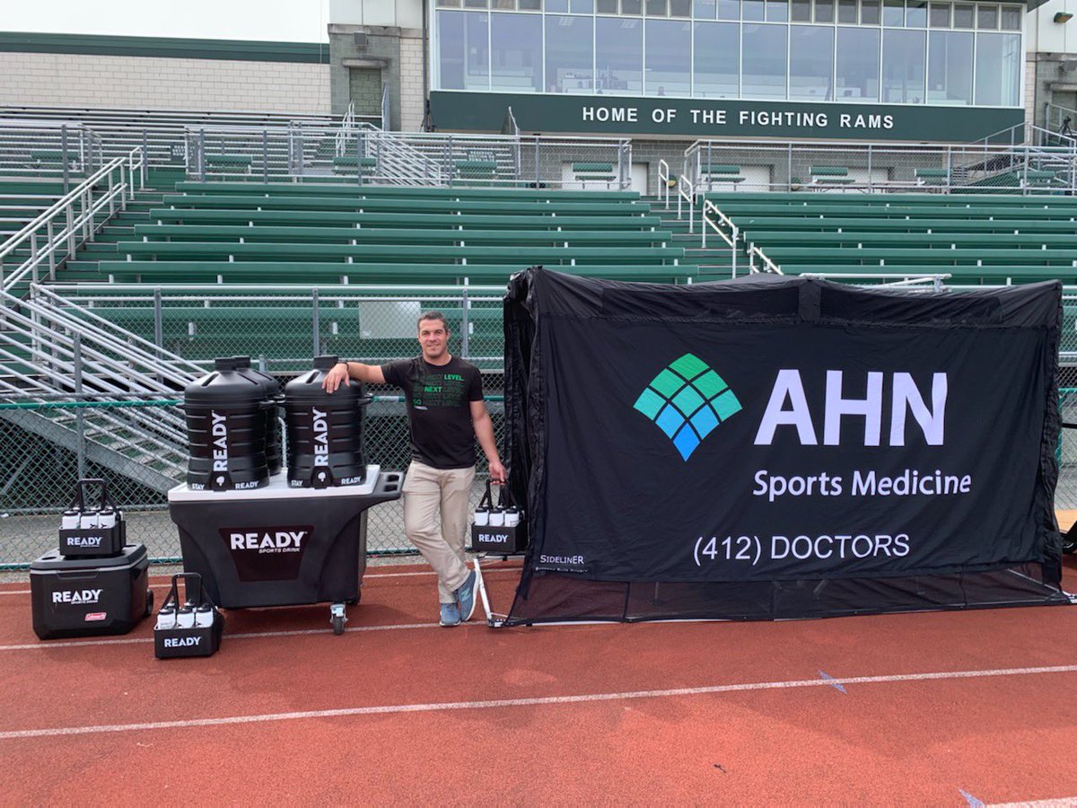 @AHNSportsMed AT Matt Mahood posing infront of our @ready_nutrition football hydration set up for our battle against NA today! #RollRams! 💚🐏
