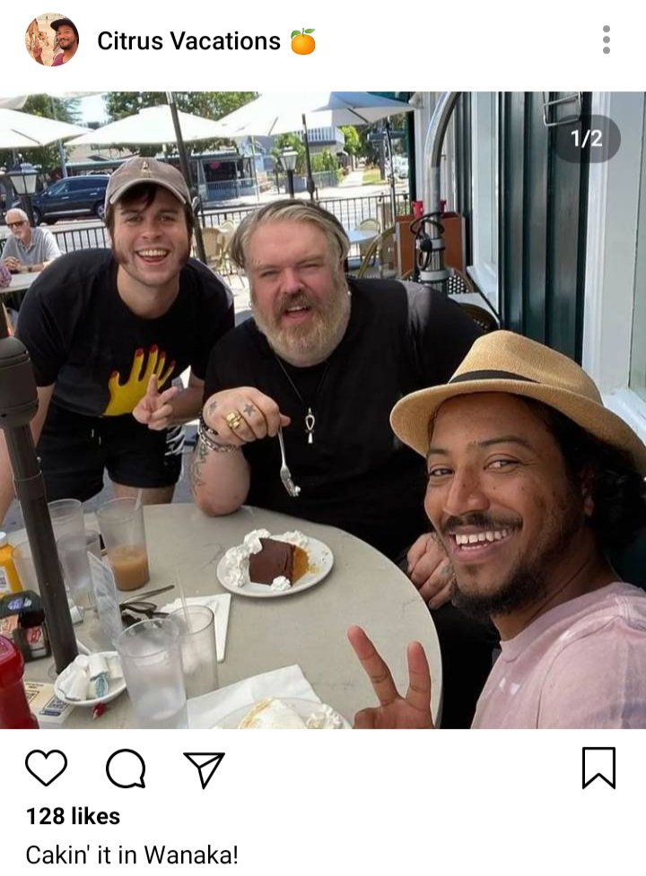 Roach's IG. Phoot of Lucius, John and Roach sitting at a restaurant. Caption: "Cakin it in Wanaka!"