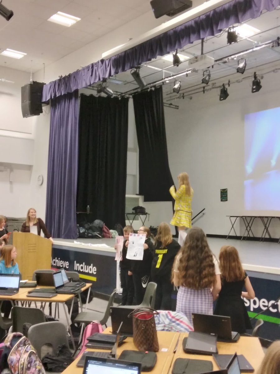 mrs_hathaway's tweet photo. Another fabulous French fashion show as part of our #EuropeanDayofLanguages celebrations and transition. So many young people modelling and speaking French in front of whole room - proud of our future @newbattlehigh linguists 👏 @MoorfootPS @GorebridgePS @StobhillPS @GoreGlen https://t.co/qKtzROVd3g