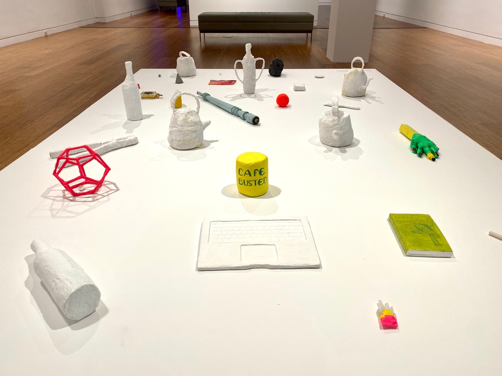 Erin Washington created these sculptures during the pandemic. They depict objects that relate to her daily routines during her time in quarantine, and each has a unique significance and story. Coffee, cigarettes, and four broken tea kettles are a few. What would your objects be?