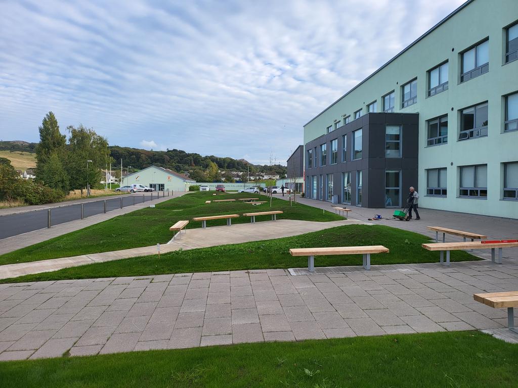 Bench seats being installed at Presentation collage Bray.
