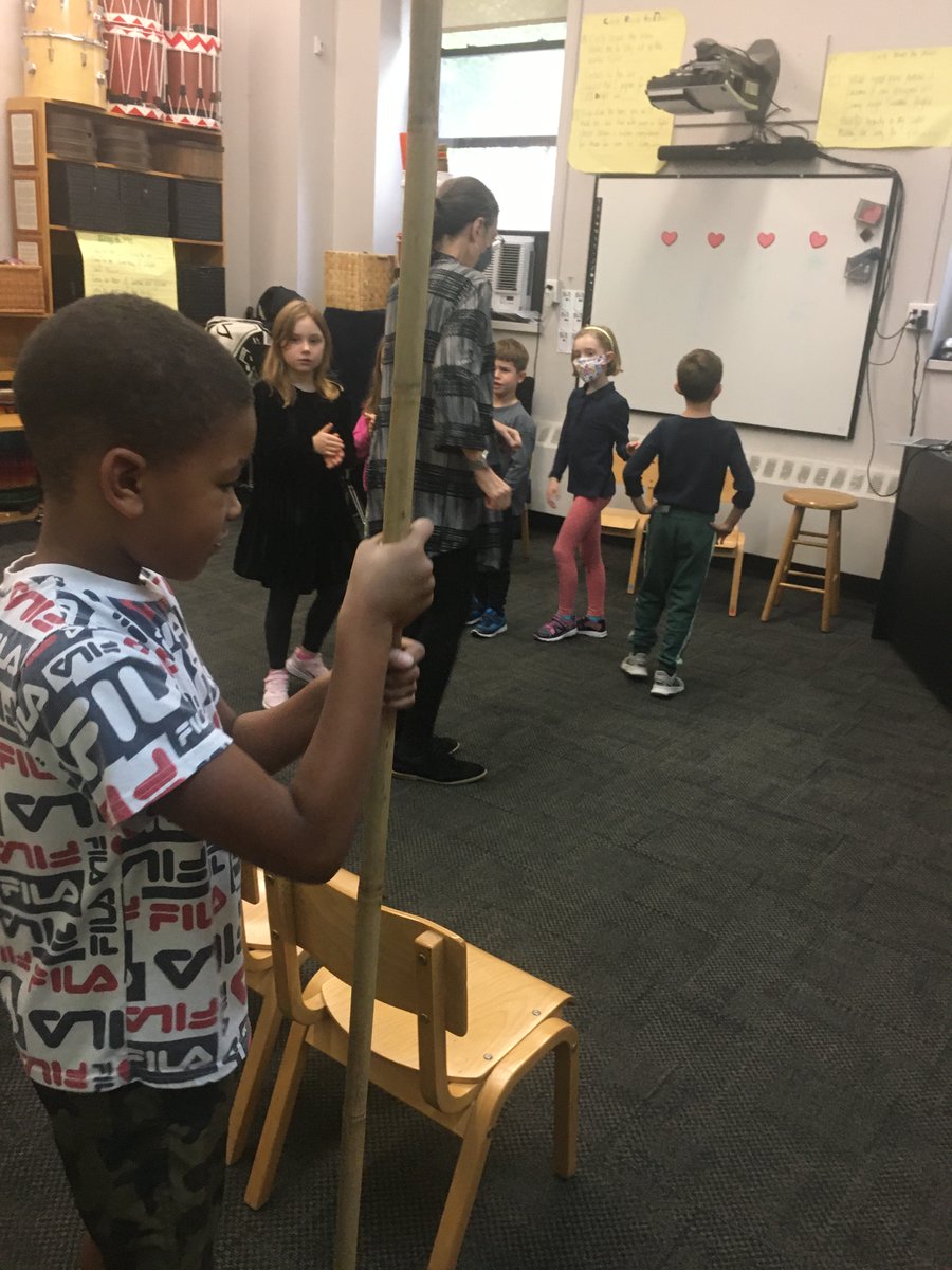 CaedmonMusic's tweet photo. Practicing Gullah Geechee traditional music First and  Second Grades.  #CaedmonCourageous #CaedmonMusic #CaedmonCommunity #TheCaedmonStory.  Playing the main rhythm pattern with the pole and practicing our shuffle steps. https://t.co/poZoR0cjD3
