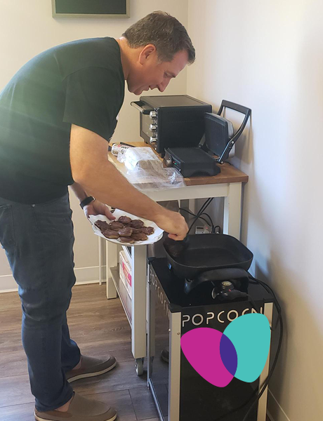 ASCPharm's tweet photo. ASCP’s chief executive, Chad Worz, PharmD, BCGP cooking up some Goetta to bringing a bit of his hometown to the ASCP staff in Alexandria, VA. #GoettaFest https://t.co/lTk2D4FQlo
