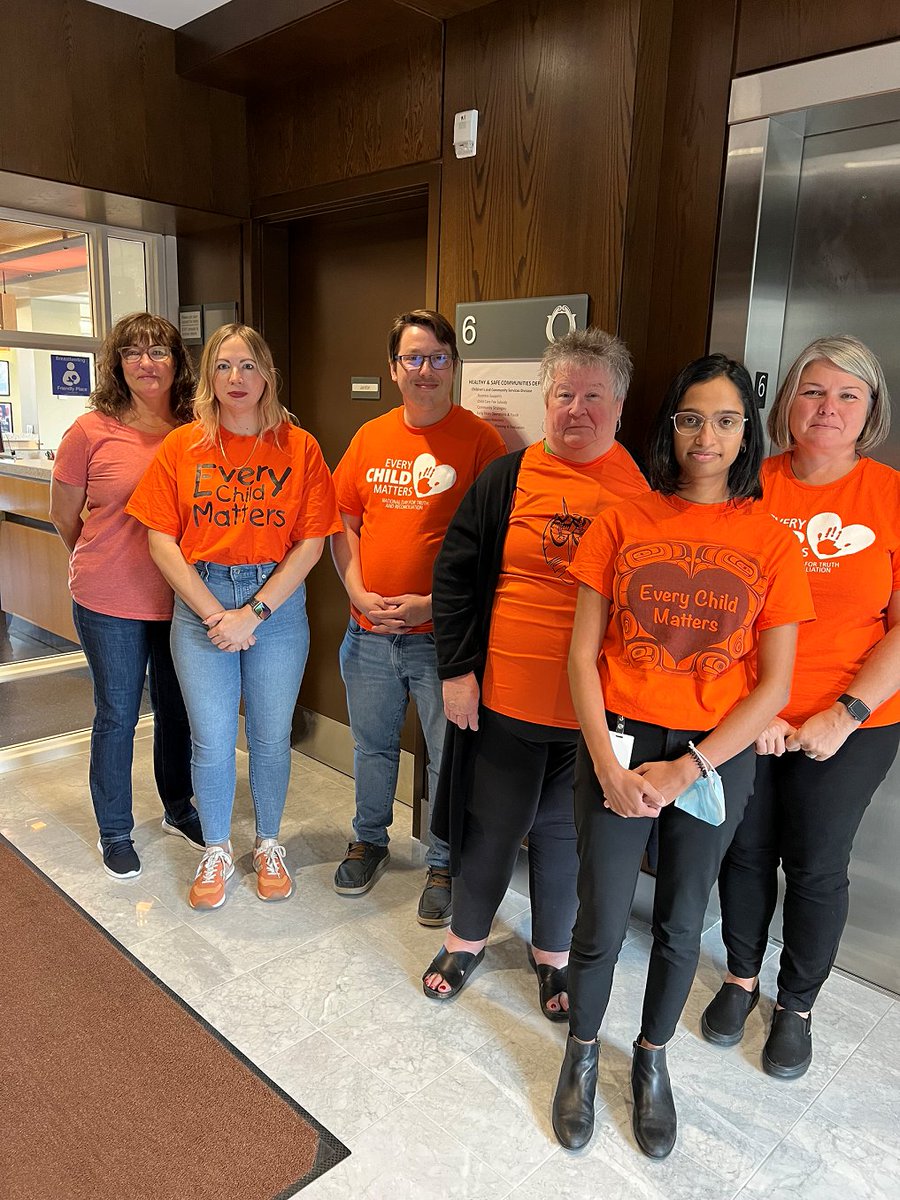 cityofhamilton's tweet photo. City of Hamilton staff showing their support for #OrangeShirtDay today, wearing orange to honour residential school survivors and their families in the spirit of reconciliation. https://t.co/sSaKXTuBNX