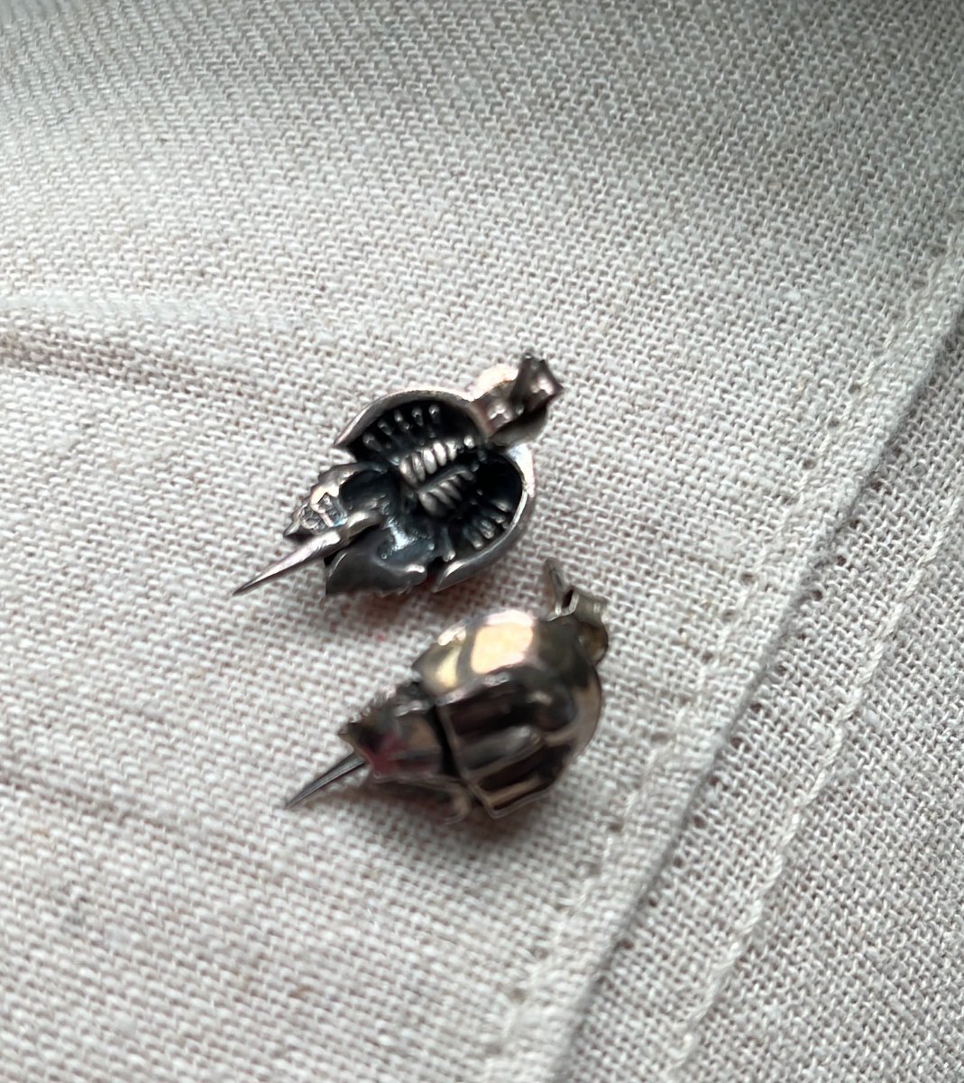 MrsH_sci's tweet photo. It was Beach Day for spirit day today, so of course I represented #TeamInvert with my horseshoe crab earrings and Cape Henlopen shirt. The little tails on the earrings move! And yes I am STILL SALTY about the Secretary Bird stomping the hsc to death in #2018MMM https://t.co/2YHR2RMWbd