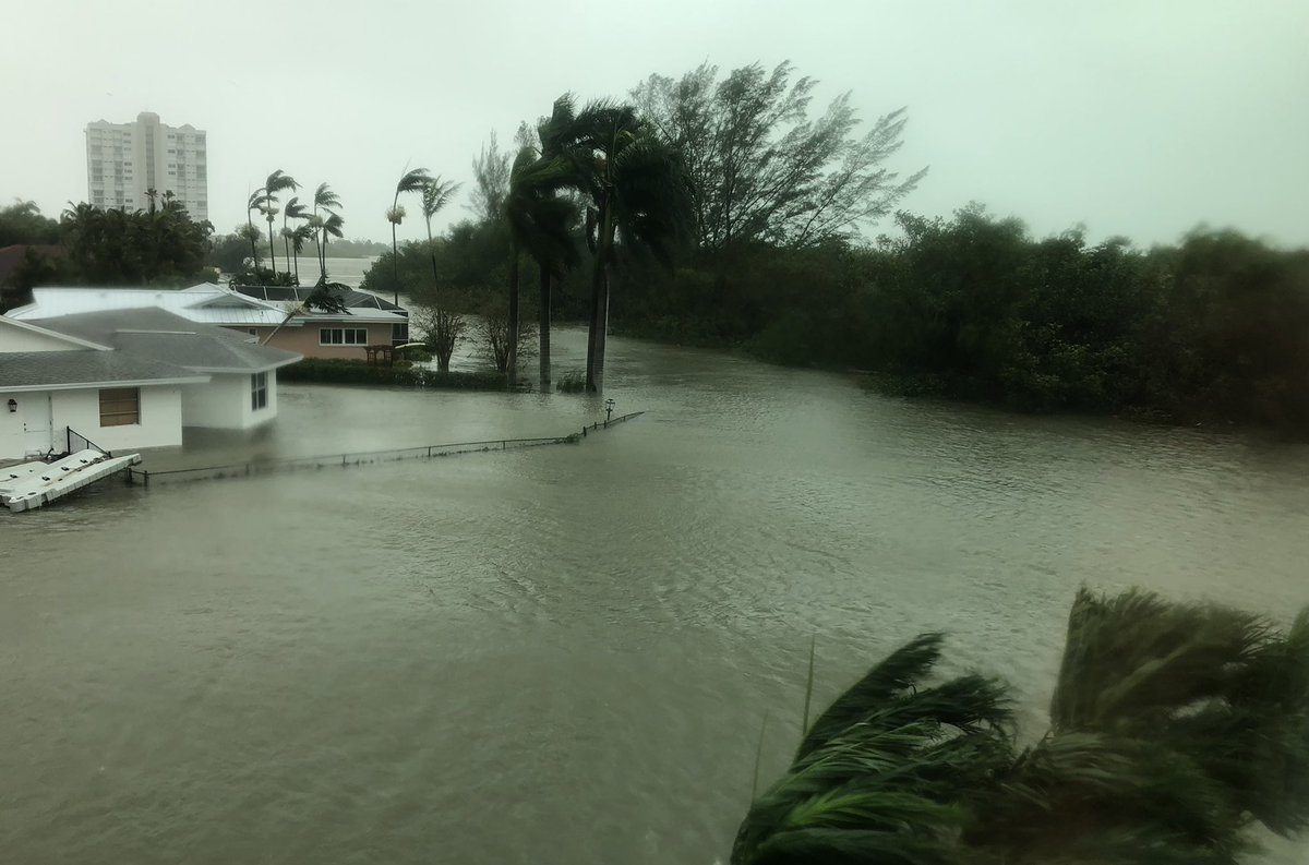 KayakMusky's tweet photo. @MikeJanssenWX @WeatherBug We have witnessed a catastrophic marine flooding event in Naples. The water is now receding.  We are safe the wind seems to have shifted and has not diminished. https://t.co/dNvoeZJQFk