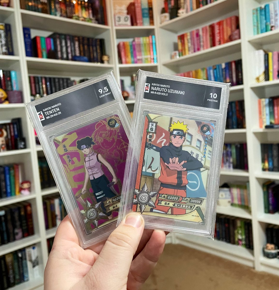 laneeeeieio's tweet photo. Just received my order of two Naruto mystery packs from @tgacards ! Awesome looking cards and amazing grades! I also love the slabs. Already ordered two more (secretly hoping for a Zabuza since he’s one of my faves). Can’t wait for them.
#tgacards #naruto #anime #cards #grading https://t.co/orSNLQRb5a