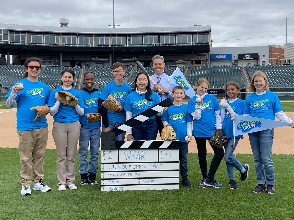 WKAR's tweet photo. Season 9 of #CuriousCrew is underway!Dr Rob and cast had a BALL exploring #BaseballScience ⚾️at #JacksonField home of the @LansingLugnuts It was a TEAM effort with #LCC @LCCStarsAD @Lansing-Stars @SoftballLansing players taking the field in the name of #STEMeducation #StayCurious https://t.co/PkJ8WbFwfs