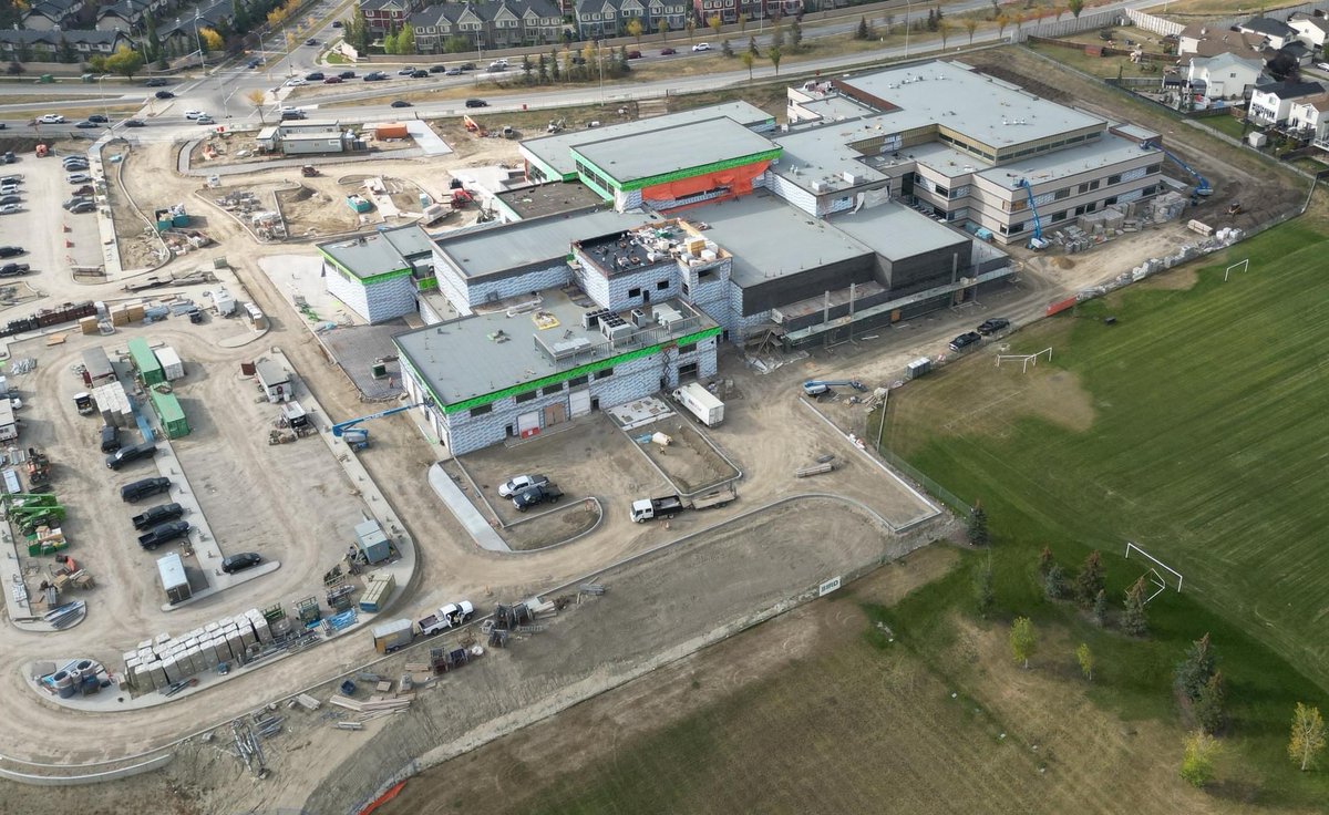 YYCNorthHigh's tweet photo. SEPTEMBER UPDATE: Bird’s Eye View of the School Construction. 
#TeenageTsunami 🌊 #yycNorthHighBUILD #yyc #abed #WeAreCBE #abpoli https://t.co/wRs60eReGR