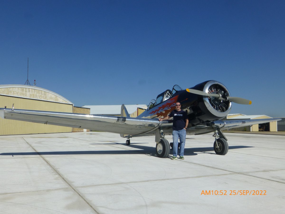 Finally got the pictures back.  Last weekend I got to fulfil a lifelong dream of flying a plane.  I got to take a 1942 T-6 Texan for a spin and do aileron rolls, barrel rolls, and loops.  It was a blast!