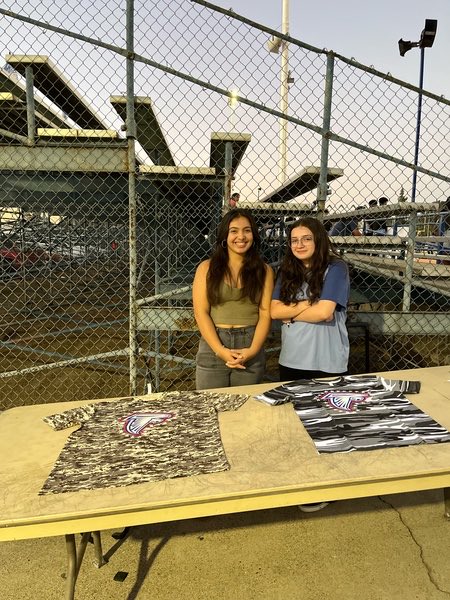 These two are amazing!! Selling camo shirts at tonight’s military appreciation night!! #falconinkandapparel <a href="/AtwaterFalcons/">Atwater High School</a> <a href="/AtwaterFootball/">Atwater Football</a>