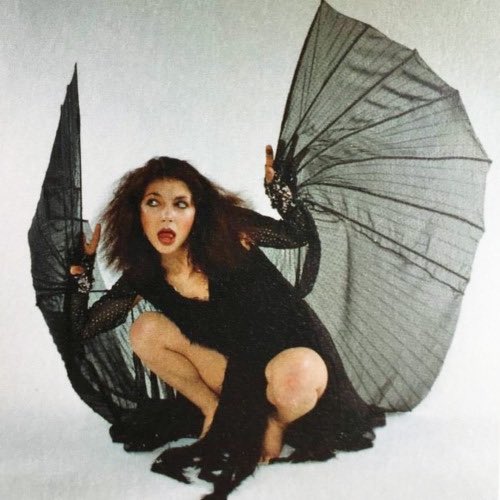 Happy spooky season from Kate Bush dressed as a bat