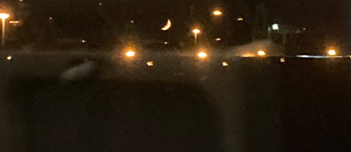 NeeterLou's tweet photo. The moon as seen from northbound Amtrak Coast Starlight near Emeryville, CA on 9/29/22 at 9:31 PM https://t.co/oET23aRD4e