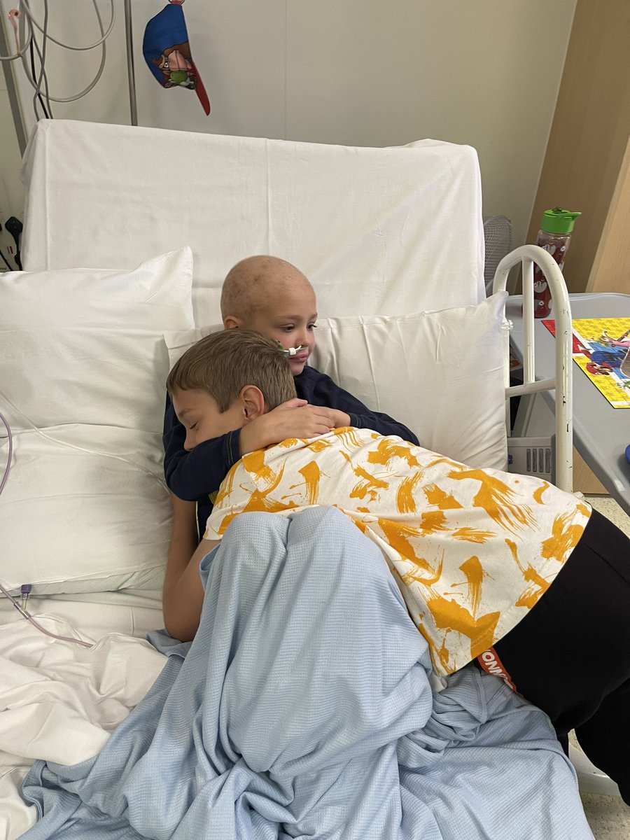 Woodbrk's tweet photo. Almost 6 weeks ago we found out our 7 year old Theo has non-Hodgkin’s lymphoma and he’s been in hospital ever since - several rounds of chemo down already. Yesterday he got to see his brothers face to face for the first time since the initial GP appt, and my heart melted. https://t.co/DsyYoc68d7