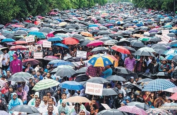 odishabhaskar's tweet photo. In the recent mass agitation done by @OGCEA more than 50,000 people from 47,477 villages joined the event amidst heavy rain, demanding #AbolishContractualSystemOdisha, #EqualPayforEqualWork, #Count6YearsInServicePeriod; govt assured to take possible step within 15 days 
#Odisha https://t.co/vjx7ZHqy10