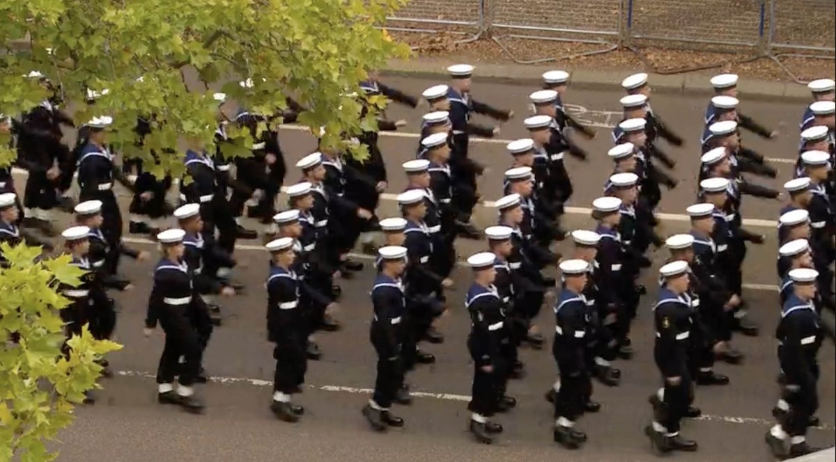 NavyLookout's tweet photo. Naval personnel marching out of Wellington Barracks on their way to participate in the #queensfuneral https://t.co/110sMw9pF5