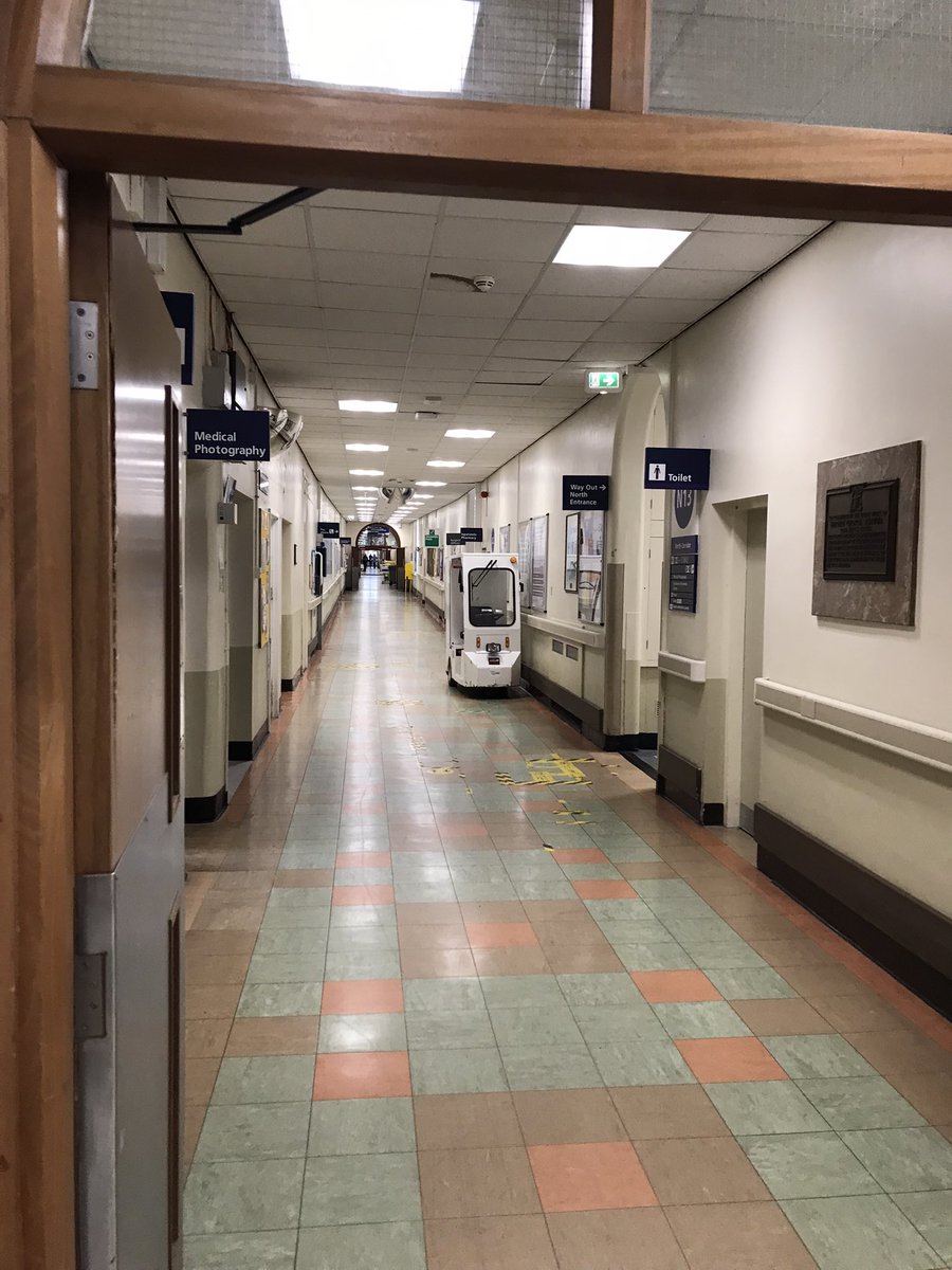 Simondroe's tweet photo. Eerily quiet on North corridor at City hospital. Distant sounds of the funeral service. Behind the doors NUH staff doing what they do every day. Thank you for everyone working today to keep our patients safe- #teamCAS https://t.co/HX2TnGW5ae