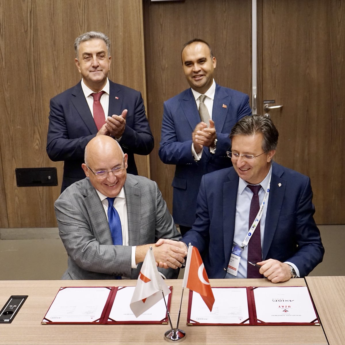 Axiom_Space's tweet photo. Axiom Space and Türkiye signed a historic agreement to send the first Turkish astronaut to space and expand scientific development on Earth and in orbit. 

We are excited to see Türkiye join the international community of space explorers. #IAC2022  https://t.co/Vxhb7cMPSC https://t.co/U7MGi86pgZ