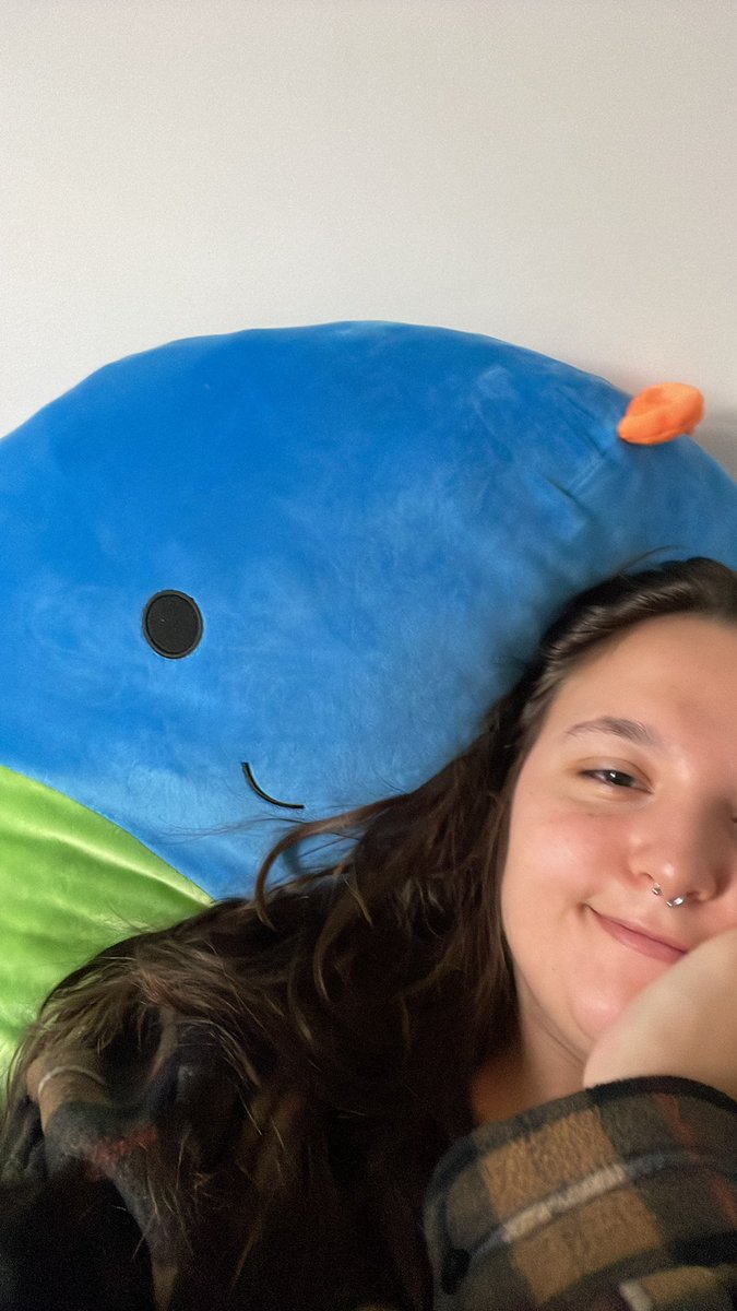 Hello it is I in bed, a 24 y/o with my squishmallow