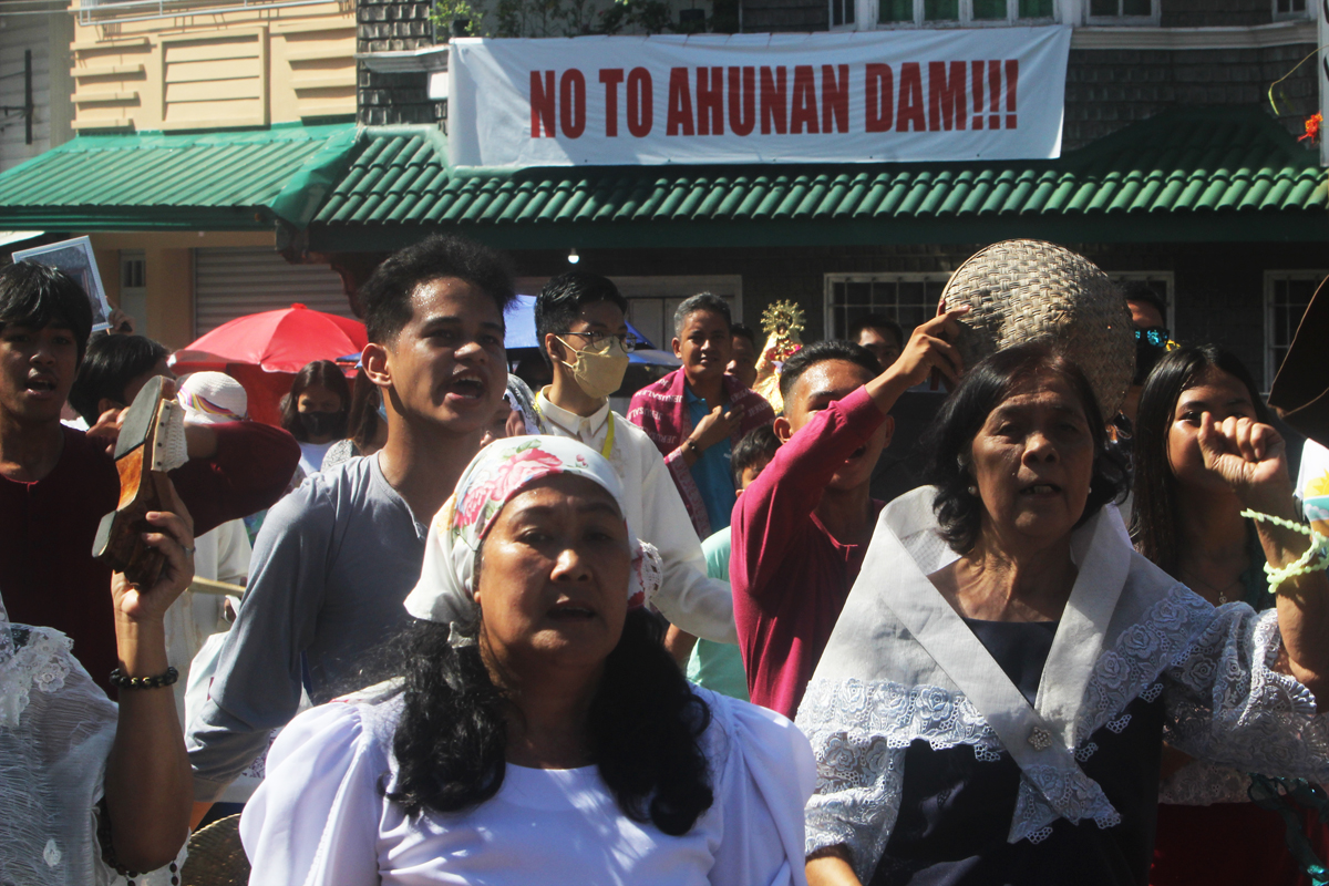 elmervalenzuela's tweet photo. Devotees of Nuestra Señora de los Dolores de Turumba march past anti-Ahunan dam banner as d town celebrates Turumba festival. A growing anger among Pakileños develops in connection w/ the $1.1 billion hydropower plant project to be built on Pakil's hilltop. #PonDNewsAsia #Pakil https://t.co/9t42etgZdk
